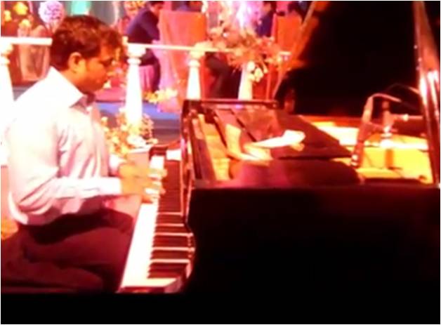 male piano player nagpur